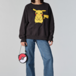 Levi’s Pikachu sweater and Pokeball bag